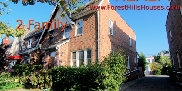 rego park semi detached brick house for sale.